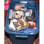 A box of Playstation and Playstation 2 games.