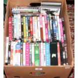 A box of DVDs including stand up comedy, action movies, T.V series etc.