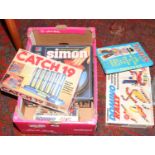 A quantity of boxed and complete board games including, Misfits Catch 19, Simon etc.