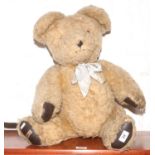 A large Boo-Boo toys teddy bear with growler.