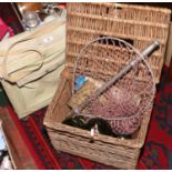 A vintage fishing basket and contents landing net, green glass floats,