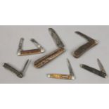 Six bone handle pocket knives to include a T. W. Eaton & Co. Sheffield example.