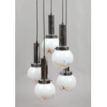 A retro five drop chrome and Murano milchglas suspension light fitting with globular shades.