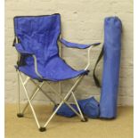 Two folding camping chairs in carry case.