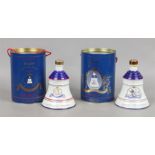 Two boxed Wade Royal decanters of Bells Scotch Whisky, full and sealed.