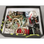 A box of costume jewellery to include bead bracelets and necklaces, white metal bracelets, yellow