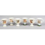 Six limited edition Caverswall bone china Christmas goblets.