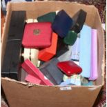 A box of assorted empty jewellery boxes.