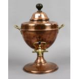 A Victorian copper and brass samovar.