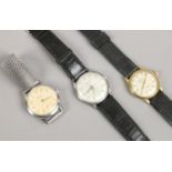 Three vintage wristwatches including manual examples one on bracelet strap.