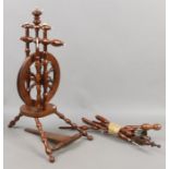 An antique fruit wood and ivory spinning wheel for restoration.