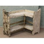 A vintage painted two tier pine corner shelf.