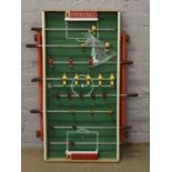 An Eria table football game on folding base.