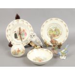 A collection of Bunnykins items to include a clock, bowl, plate and penny bank along with Maruri