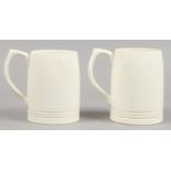 Two Keith Murray Wedgwood tankards.