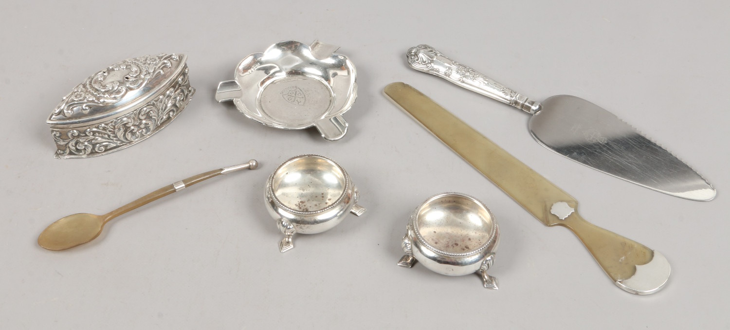 A quantity of silver and silver mounted items including a pair of salts, trinket box, letter