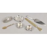 A quantity of silver and silver mounted items including a pair of salts, trinket box, letter