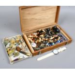 A box of costume jewellery, Wade whimsies and pen knives.