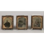 Three 19th century Ambrotype photographs, portraits of seated ladies and a gentleman.