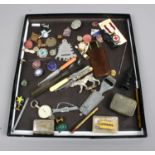 A tray of mixed collectables to include enamel badges, glass picture slides, Aero knitting pin and