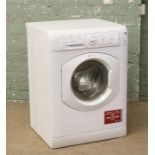 A Hotpoint Aquarius washing machine model number WML540.