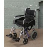 An Excel folding wheel chair.