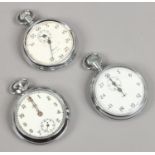 Two Smiths chrome pocket stop watches and a Smith Empire pocket watch.