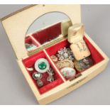 A jewellery box and contents of costume jewellery including brooches, pendants, earrings etc.