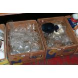 Two boxes of glasswares to include fruit bowls, vases and drinking vessels.