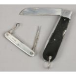 Two multi blade pocket knives including one with silver scales with pencil and ruler scale,