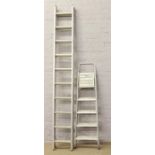 An aluminium 10 rung double ladder by Clima ladders, along with a pair of aluminium steps.