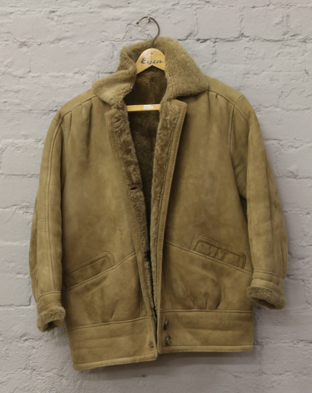 A ladies sheepskin coat, size 12.