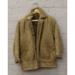 A ladies sheepskin coat, size 12.