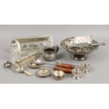 A box of mixed white metal and silver items including pierced cake basket, Indian tray and sugar