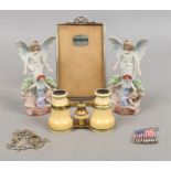 A group of collectables to include opera glasses, bisque figures, silver plate photograph frame