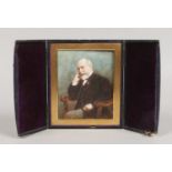 An Edwardian portrait miniature on opaque glass of a seated gentleman in leather strut case.