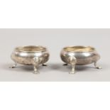 A pair of George III silver salts raised on stepped feet, assayed London 1776, total weight 120