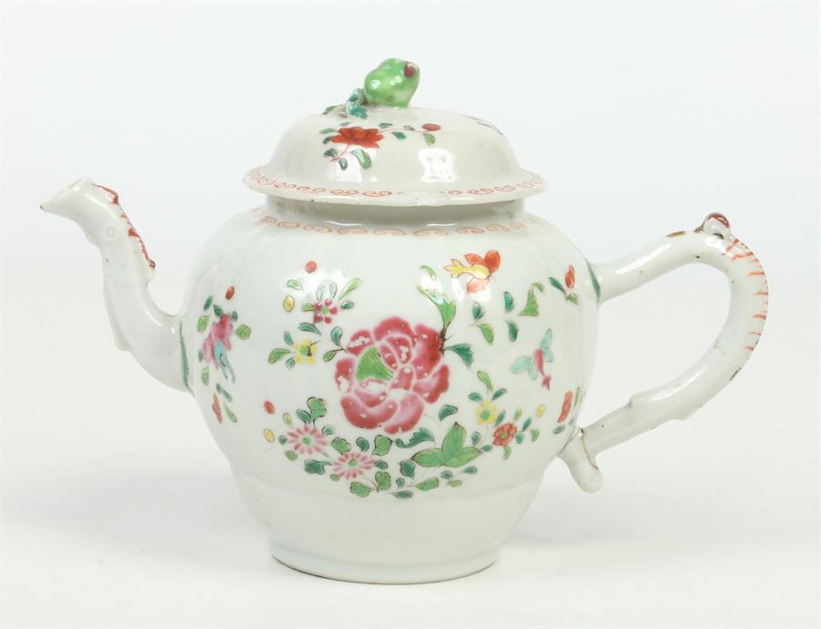 An 18th century Chinese export famille rose teapot and cover. The finial moulded in the form of a