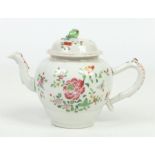 An 18th century Chinese export famille rose teapot and cover. The finial moulded in the form of a