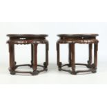 A pair of Chinese late 19th / early 20th century carved hardwood dish top plant stands. With petal