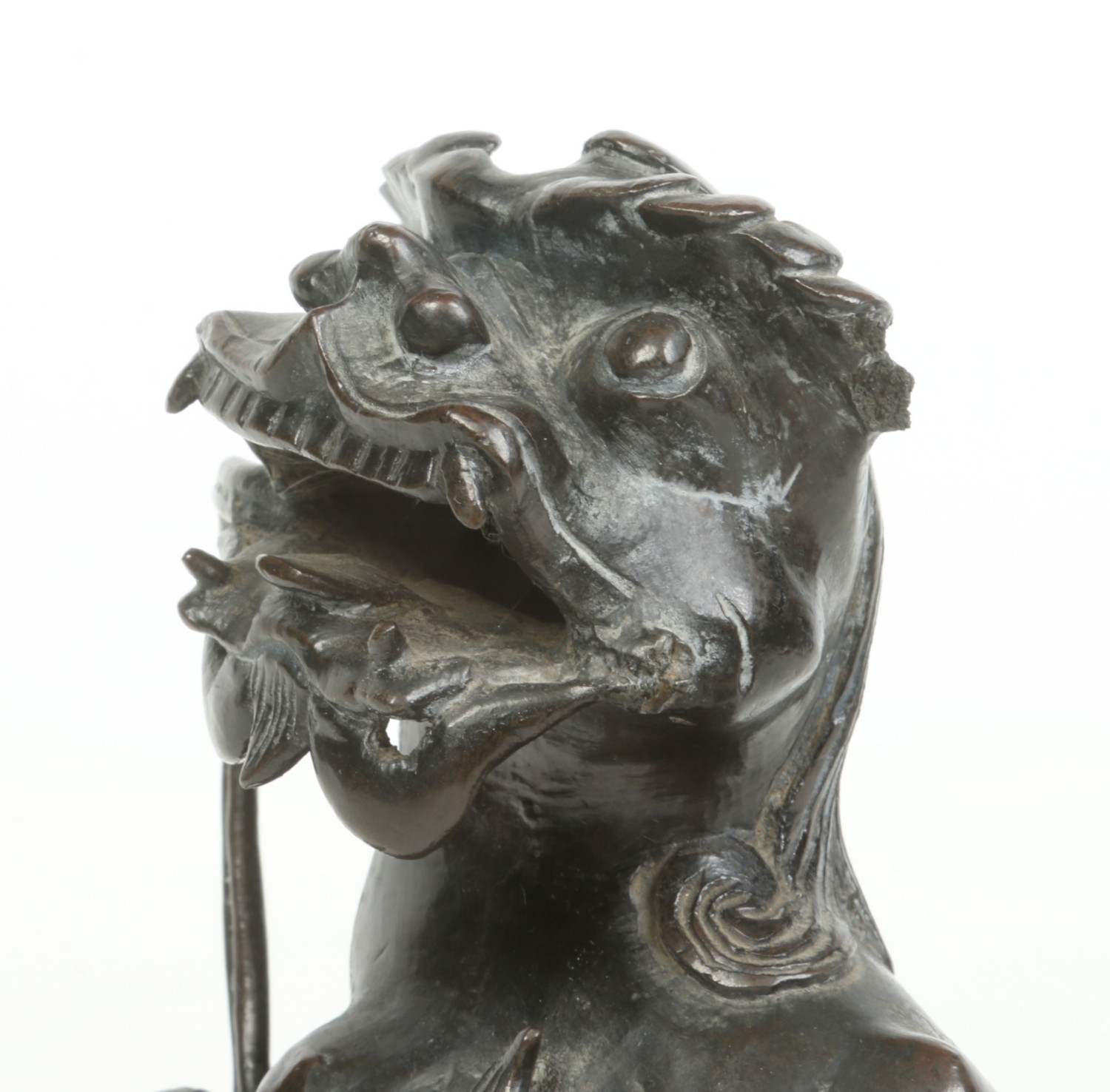 An antique Chinese patinated bronze sculpture of a lion dog guarding a brocade bowl, possibly - Image 3 of 7