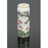 A Chinese famille vert cylindrical snuff box. Painted with a pair of dragons chasing a flaming pearl