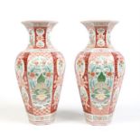 A pair of large Japanese Meiji period enamelled mantel vases of hexagonal baluster form. Red