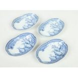 Four Japanese early 20th century blue and white serving dishes of lobed form. Painted in