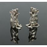 A pair of cast sterling silver novelty salt and pepper shakers formed as a mice. Each stamped 925