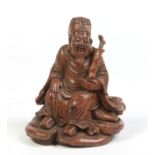 A Chinese late 19th century bamboo carving of a seated sage, 13.5cm. Condition report intended as