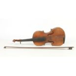 A 19th century violin and bow in case. No makers marks to either, 35.75cm.