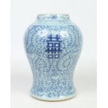 A large 19th century Chinese baluster vase. Painted in underglaze blue with a key fret collar, lotus