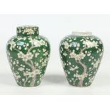 A pair of Japanese Meiji period scent jars with inner covers and one with a domed cover. Green