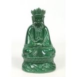 A Chinese green glazed figure of a crowned Buddha seated on a lotus throne, 30cm. Condition report